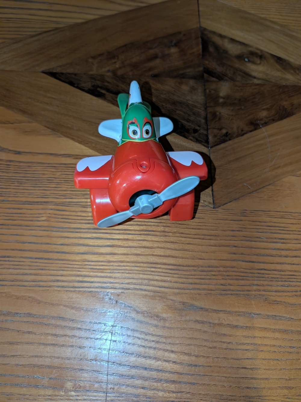 Red and Green Kids Toy Airplane with Blue Propeller